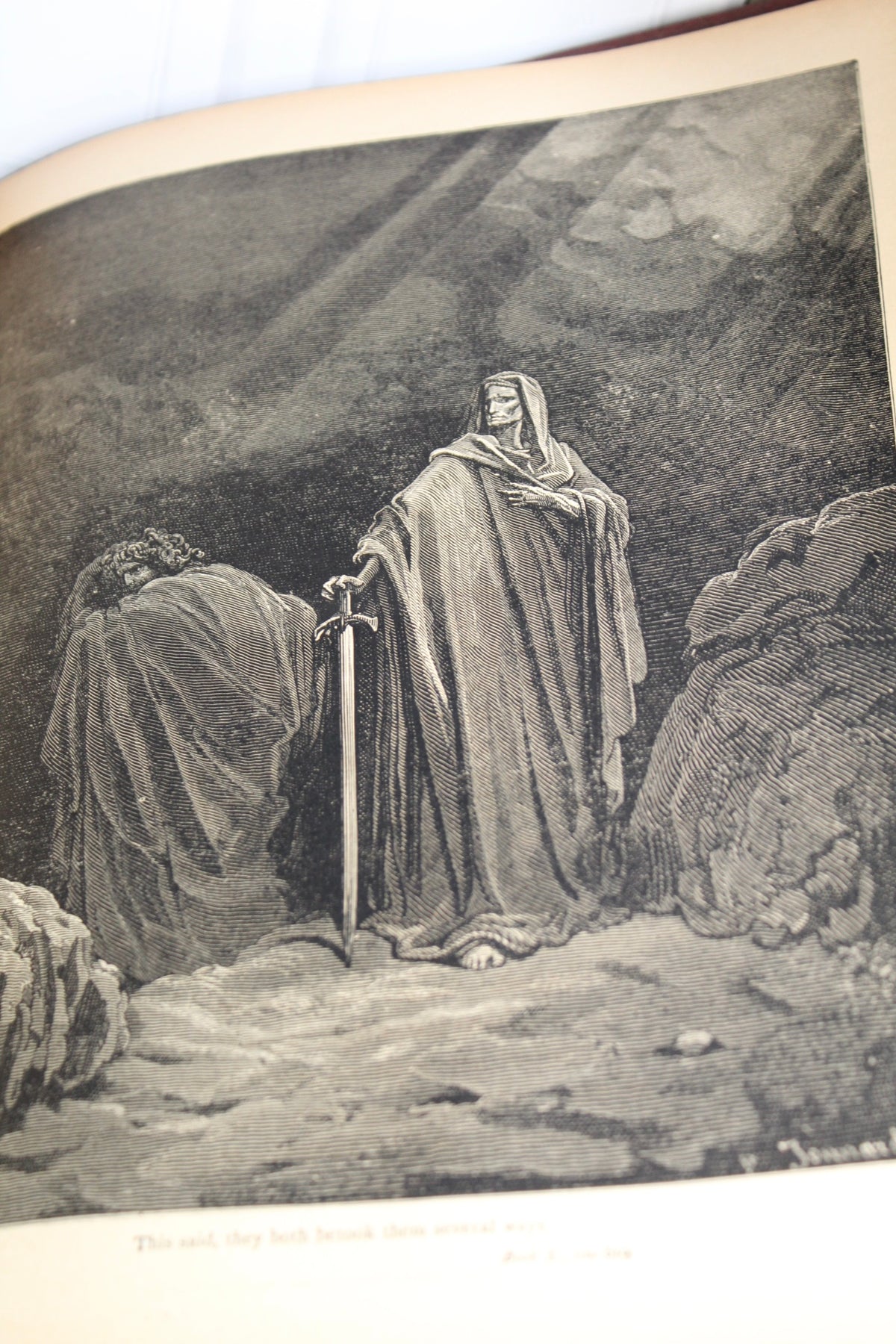 Gustave Doré engraving from Paradise Lost showing two figures and a sword.