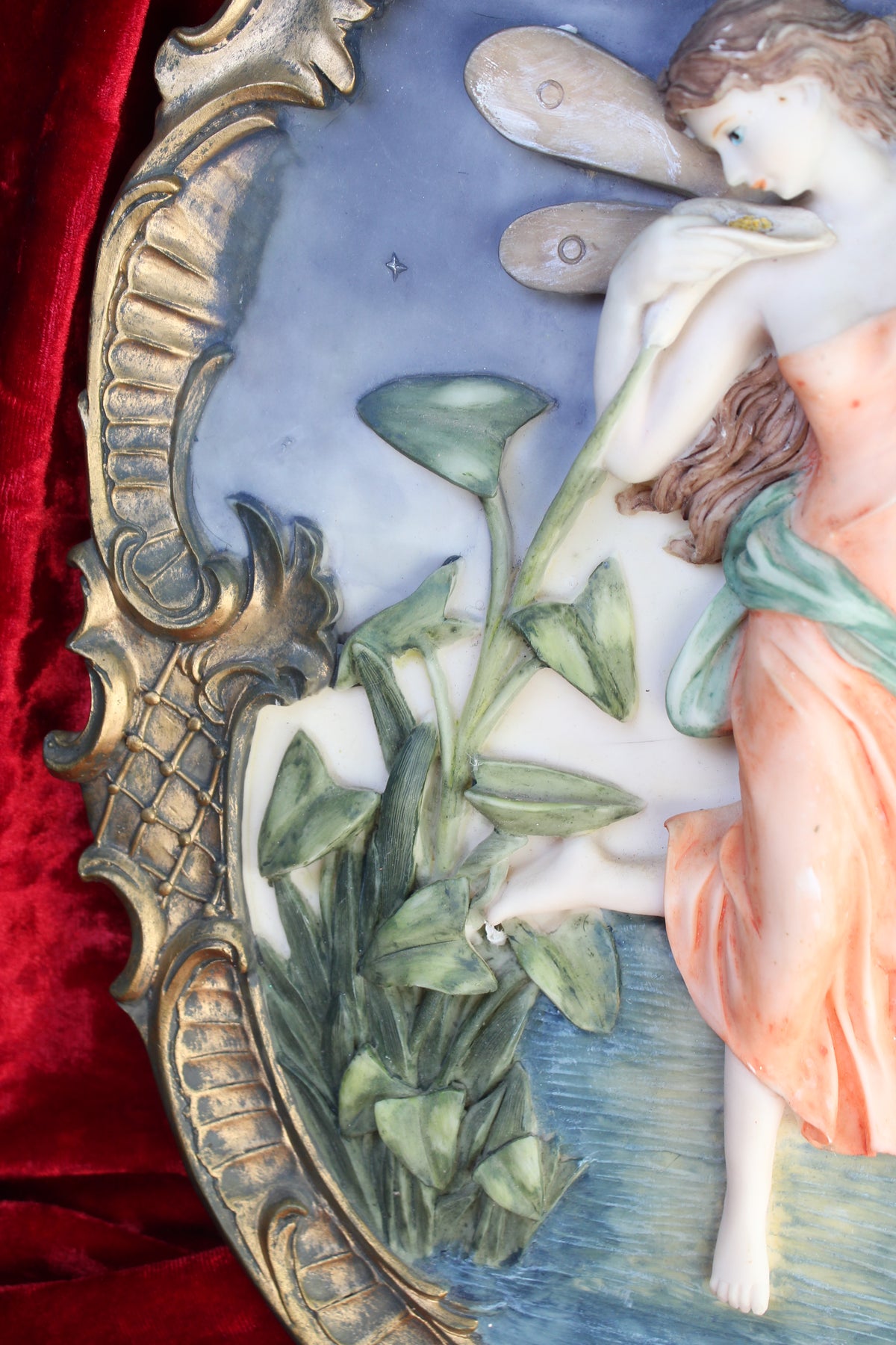 Vintage night fairy wall plaque with ornate gold frame, surrounded by plants and a starry sky.