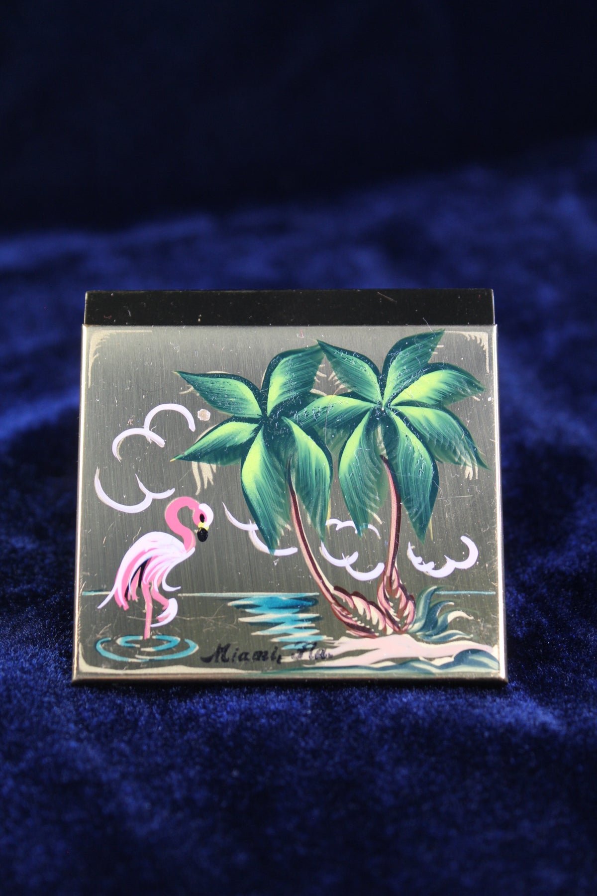 1950s Miami powder compact with hand-painted flamingo, palm trees, and "Miami, Fla."
