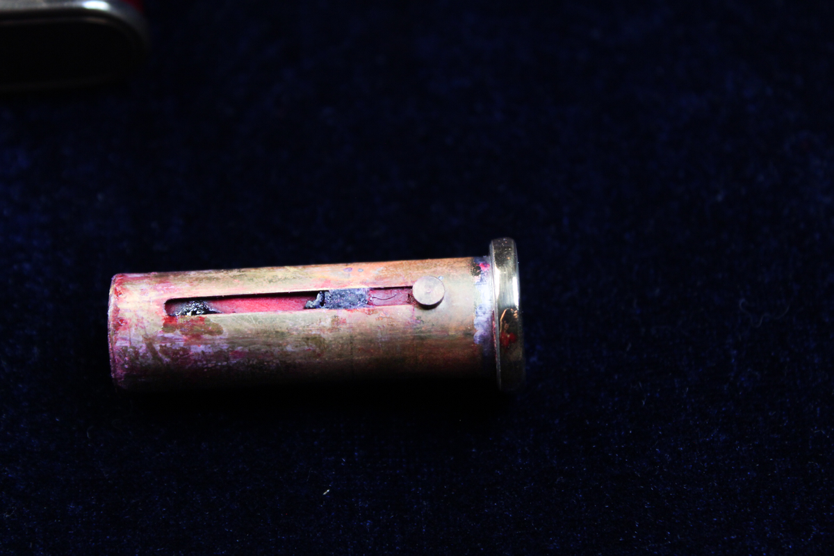 1940s German novelty compact with tortoiseshell cigarette holder, brass casing.
