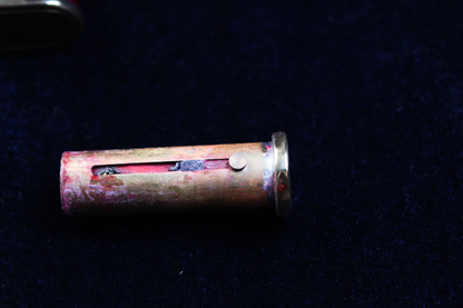 1940s German novelty compact with tortoiseshell cigarette holder, brass casing.