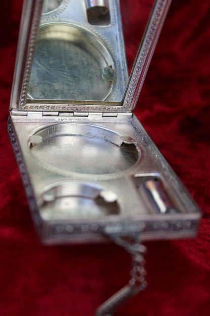 Antique French sterling silver compact with guilloché enamel rose panel and paste stones.