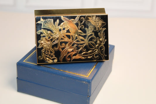Jaestial Vintage Musical Compact with gold floral enamel on a blue box.