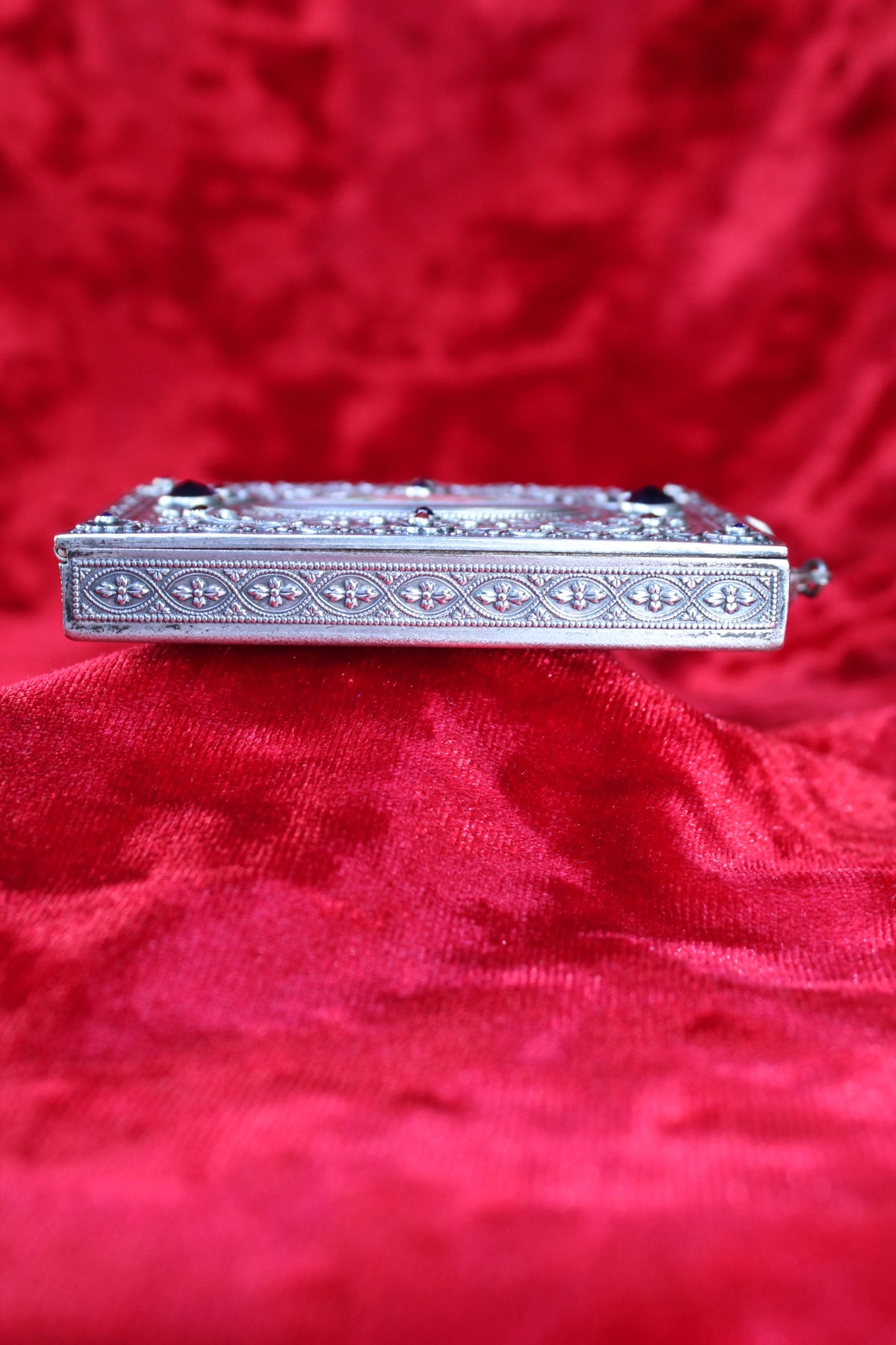 Antique French sterling silver compact with guilloché enamel and jeweled accents.