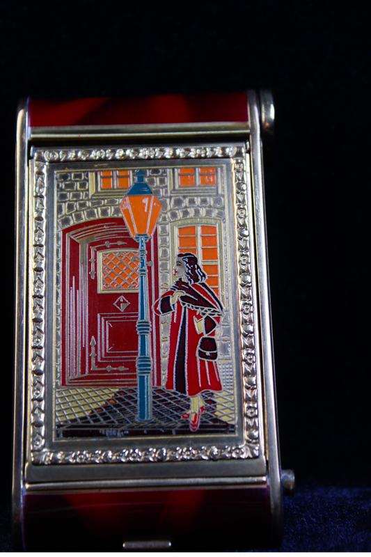 Vintage German novelty compact with tortoiseshell cigarette holder, featuring an enameled street scene.