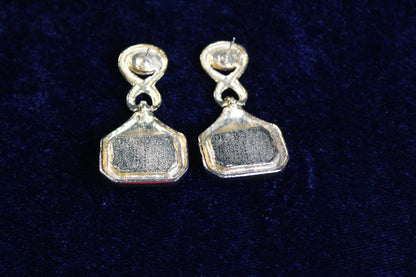 Jaestial Countess 80's blue and gold statement earrings with a rectangular blue inset.