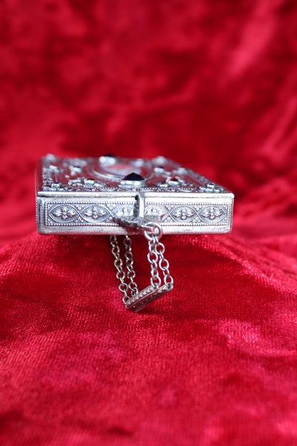 Antique French sterling silver compact with guilloché enamel and jeweled accents, circa 1920s-1930s.