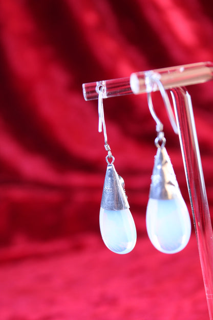 Sterling silver earrings with opalite teardrops, marked 925.