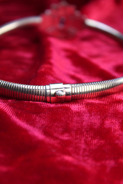 10K rose gold filled snake chain choker necklace with a blue glass center stone and Art Deco design.