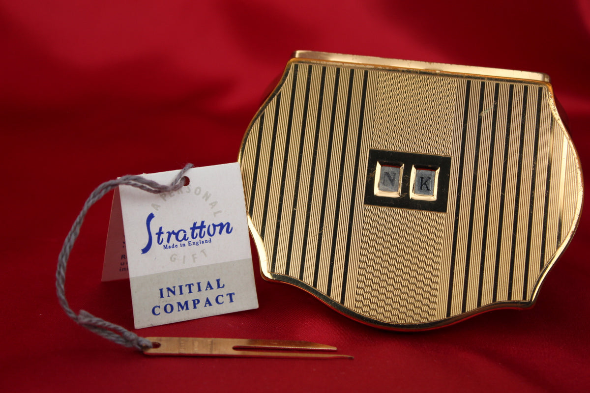 Unused 1950s Stratton “Dial Your Own Initial” Compact
