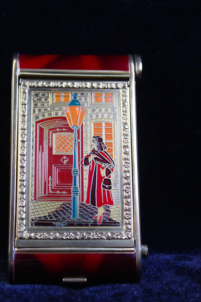 1940s German novelty camera compact with tortoiseshell cigarette holder and street scene design.