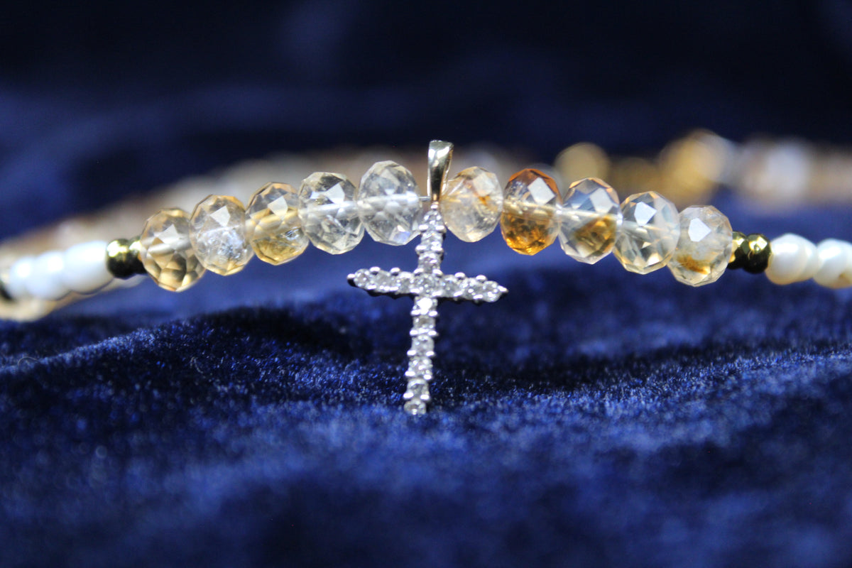 10K gold necklace with citrine beads, freshwater pearls, and a pavé cross pendant.
