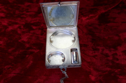 Antique French sterling silver compact with guilloché enamel rose and paste stones, circa 1920s-1930s.