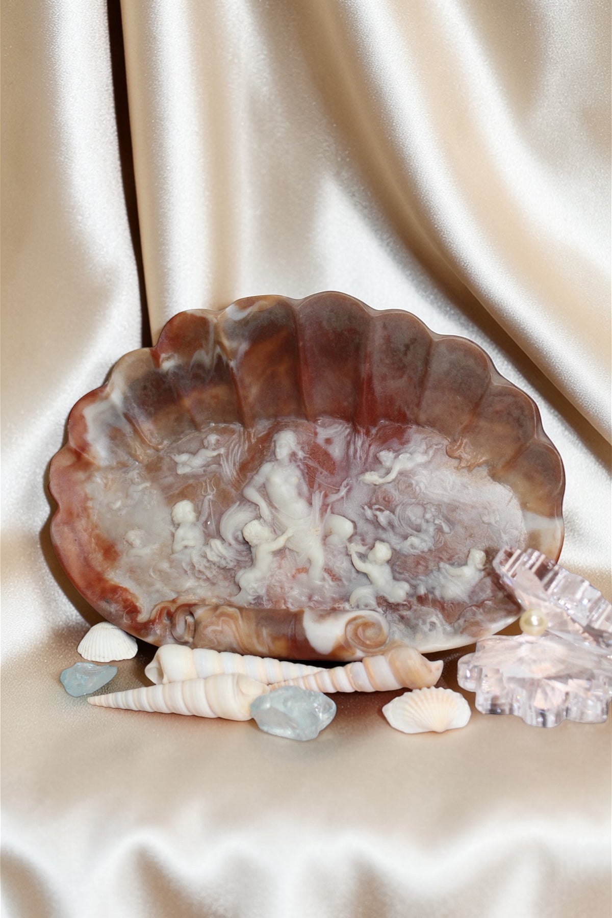 Incolay Goddess of the Sea jewelry dish with seashells and glass accents on satin.