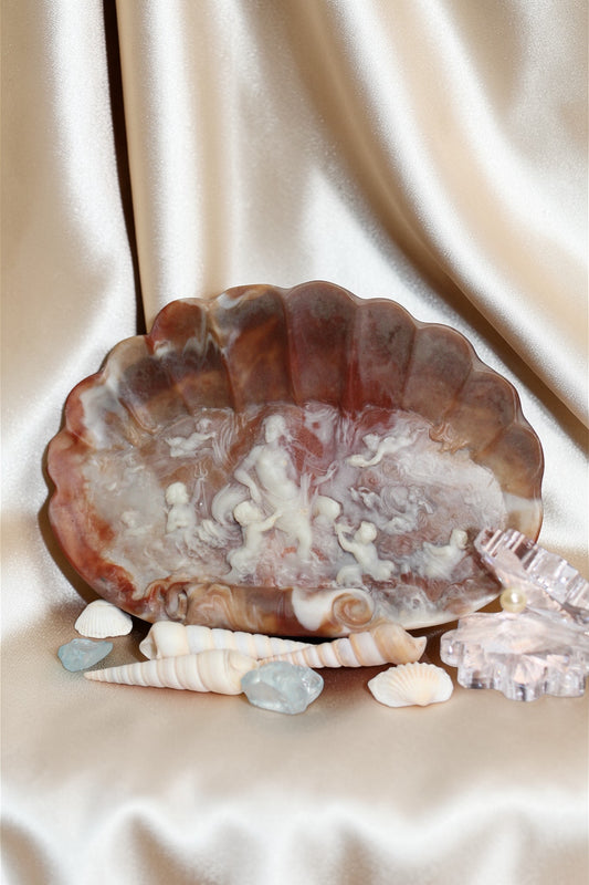Incolay Goddess of the Sea jewelry dish with seashells and glass accents on satin.