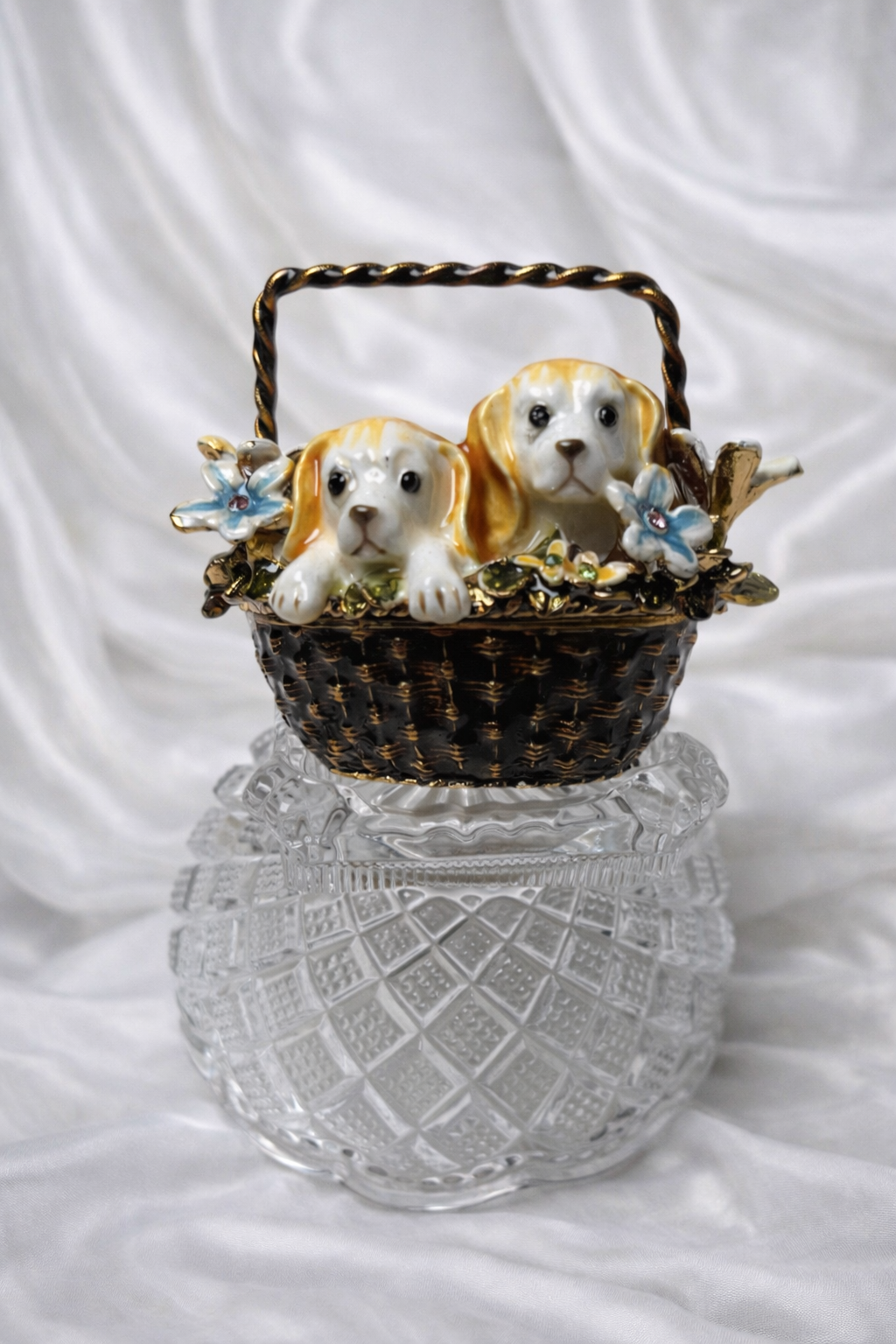 Jaestial Jeweled Puppy Basket Trinket Box with two puppies in a basket with flowers on a crystal base.