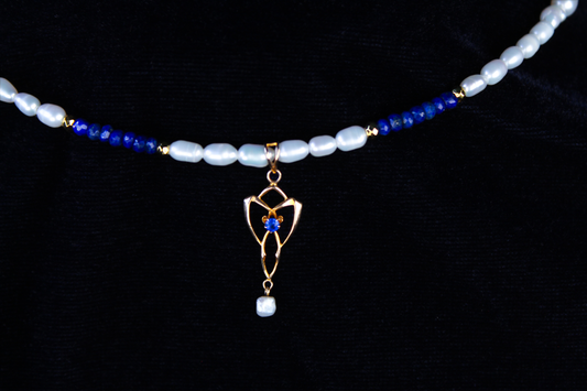 10K gold lavalier necklace with lapis lazuli and freshwater pearls.