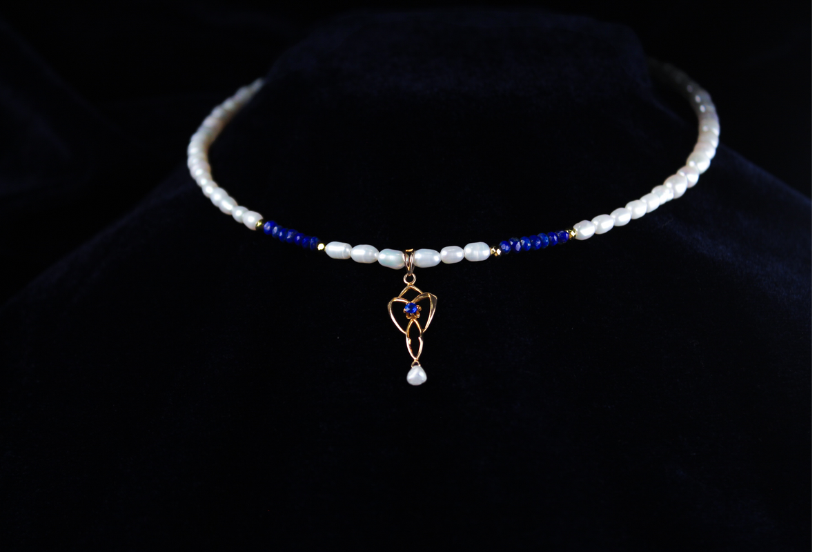 10K gold lavalier necklace with lapis lazuli beads and freshwater pearls, featuring a vintage pendant.
