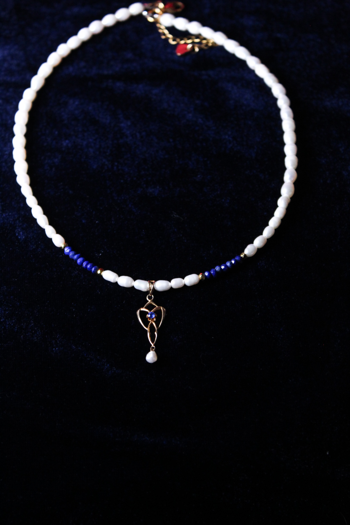 10K gold lavalier necklace with freshwater pearls and lapis lazuli beads.