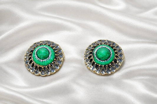 Jaestial vintage emerald green statement clip-on earrings with ornate detailing.